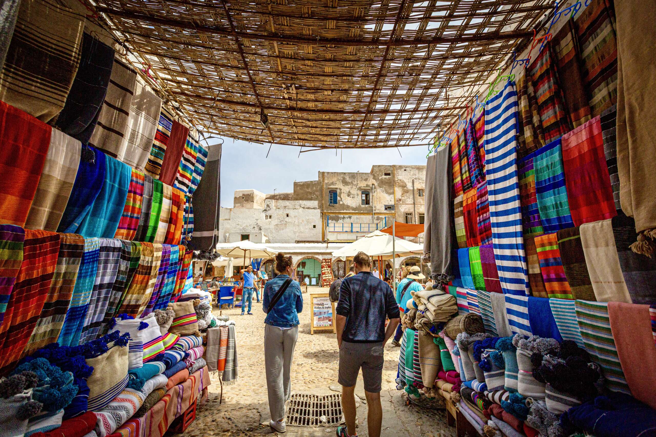 tourists-walking-through-moroccan-market-of-colour-2026-01-06-00-54-03-utc